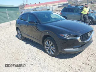 2023 Mazda CX-30 S Carbon Edition with VIN 3MVDMBCM1PM509987, listed as a IAAI auction lot 42060833 with 14,140 mi miles and . Bid and sale history available at DreamBid. Image 1.