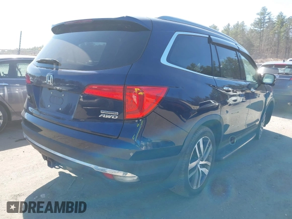 2017 Honda Pilot Touring with VIN 5FNYF6H98HB020341, listed as a IAAI auction lot 42037156 with 73,511 mi miles and . Bid and sale history available at DreamBid. Image 4.