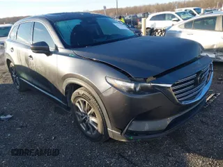 2022 Mazda CX-9 Touring with VIN JM3TCBCYXN0605336, listed as a IAAI auction lot 41222449 with 45,562 mi miles. Bid and sale history available at carsss.com. Image 1.