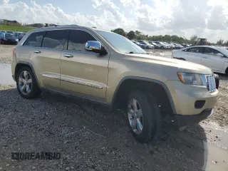 2011 Jeep Grand Cherokee Overland with VIN 1J4RS6GG4BC710103, listed as a Copart auction lot 51316235 with 179,393 mi miles and Salvage Title. Bid and sale history available at DreamBid. Image 4.