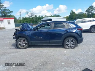 2022 Mazda CX-30 S Select with VIN 3MVDMBBL6NM448268, listed as a IAAI auction lot 42242290 with Not provided miles and . Bid and sale history available at DreamBid. Image 15.