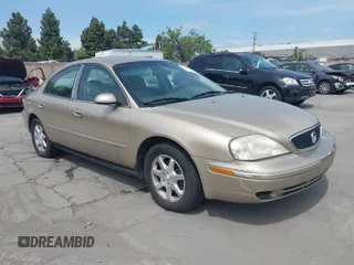 2001 Mercury Sable z VIN 1MEFM53U41G617807, wystawiony jako IAAI lot #42052087 z przebiegiem 167 010 mil mil oraz . Historia ofert i sprzedaży dostępna na DreamBid. Obrazek 1.
