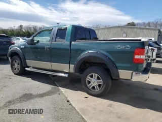 2007 Ford F-150 STX with VIN 1FTRX14W57FB39989, listed as a Copart auction lot 50695635 with 252,852 mi miles and Salvage title. Bid and sale history available at DreamBid. Image 2.
