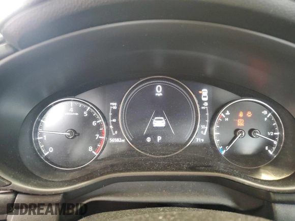 2019 Mazda 3 Select z VIN JM1BPACL2K1106950, wystawiony jako Copart lot #59481345 z przebiegiem 56 582 mil mil oraz Szkoda całkowita • Salvage title. Historia ofert i sprzedaży dostępna na DreamBid. Obrazek 9.