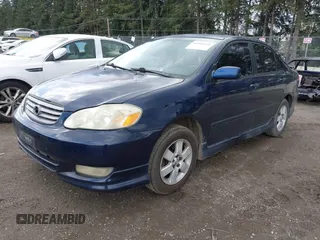2003 Toyota Corolla CE with VIN 1NXBR32E83Z084375, listed as a IAAI auction lot 41915211 with 299,999 mi miles and . Bid and sale history available at DreamBid. Image 2.