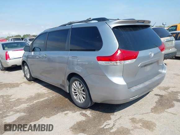 2011 Toyota Sienna XLE AAS with VIN 5TDYK3DC3BS007690, listed as a IAAI auction lot 42044640 with 253,359 mi miles. Bid and sale history available at carsss.com. Image 3.