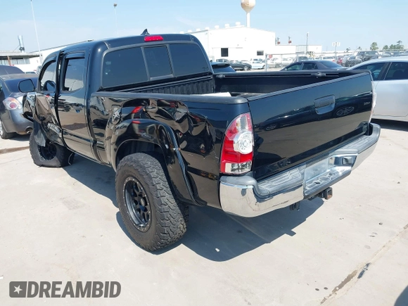 2014 Toyota Tacoma PreRunner with VIN 3TMKU4HN0EM040104, listed as a IAAI auction lot 41619179 with 171,542 mi miles and . Bid and sale history available at DreamBid. Image 3.
