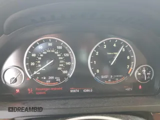 2013 BMW 7 Series 740i with VIN WBAYA6C58DC995008, listed as a Copart auction lot 62008795 with 95,974 mi miles and Salvage title. Bid and sale history available at DreamBid. Image 9.