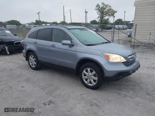 2009 Honda CR-V EX-L with VIN JHLRE387X9C006124, listed as a IAAI auction lot 41757092 with 142,038 mi miles. Bid and sale history available at carsss.com. Image 1.