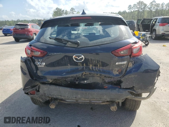 2018 Mazda CX-3 Grand Touring z VIN JM1DKFD79J0329416, wystawiony jako Copart lot #51708325 z przebiegiem 64 597 mil mil oraz Szkody całkowita. Historia ofert i sprzedaży dostępna na DreamBid. Obrazek 6.
