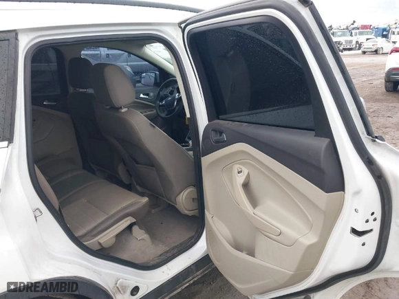 2015 Ford Escape SE with VIN 1FMCU9GX8FUC80918, listed as a IAAI auction lot 41694880 with 182,929 mi miles. Bid and sale history available at carsss.com. Image 8.