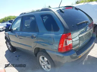 2009 Kia Sportage LX with VIN KNDJF724497602223, listed as a IAAI auction lot 42085415 with 91,105 mi miles. Bid and sale history available at carsss.com. Image 3.