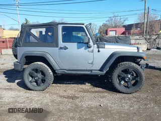 2013 Jeep Wrangler Sport with VIN 1C4AJWAG1DL595509, listed as a IAAI auction lot 41814406 with 59,263 mi miles and . Bid and sale history available at DreamBid. Image 14.