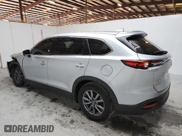 2023 Mazda CX-9 Touring with VIN JM3TCBCY9P0656636, listed as a Copart auction lot 64243905 with 59,788 mi miles and Non repairable. Bid and sale history available at DreamBid. Image 2.