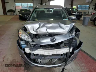2015 Mazda 5 Sport z VIN JM1CW2BL3F0181621, wystawiony jako Copart lot #57063715 z przebiegiem 95 104 mil mil oraz Szkoda całkowita • Salvage title. Historia ofert i sprzedaży dostępna na DreamBid. Obrazek 5.