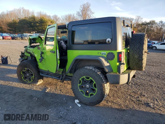 2013 Jeep Wrangler Rubicon 10th Anniversary with VIN 1C4BJWCG0DL506174, listed as a Copart auction lot 85300514 with 133,974 mi miles and Salvage Title. Bid and sale history available at DreamBid. Image 2.