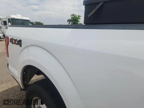 2017 Ford F-150 XL with VIN 1FTEX1E82HKD27618, listed as a IAAI auction lot 42796140 with 124,457 mi miles and . Bid and sale history available at DreamBid. Image 23.