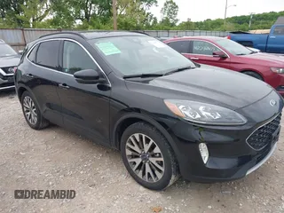 2020 Ford Escape Titanium z VIN 1FMCU9J90LUA51459, wystawiony jako IAAI lot #42309814 z przebiegiem 53 870 mil mil oraz . Historia ofert i sprzedaży dostępna na DreamBid. Obrazek 1.