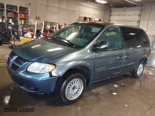 2001 Dodge Caravan Sport with VIN 1B4GP45321B213085, listed as a IAAI auction lot 41529881 with 124,818 mi miles. Bid and sale history available at carsss.com. Image 2.