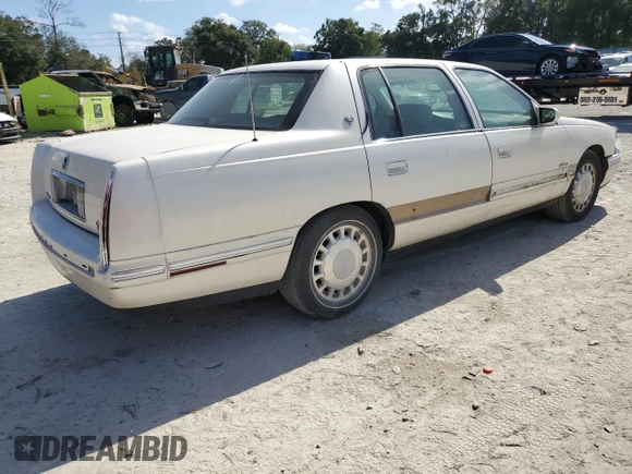 1999 Cadillac DeVille z VIN 1G6KD54YXXU794473, wystawiony jako Copart lot #79774804 z przebiegiem 44 601 mil mil oraz Czysty tytuł • Clean title. Historia ofert i sprzedaży dostępna na DreamBid. Obrazek 3.