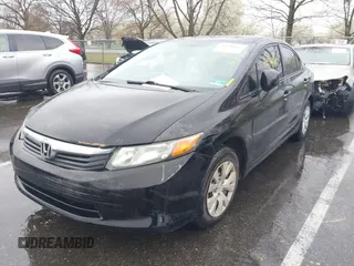 2012 Honda Civic LX with VIN 2HGFB2F5XCH605230, listed as a IAAI auction lot 41999663 with 221,815 mi miles and . Bid and sale history available at DreamBid. Image 17.
