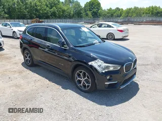 2016 BMW X1 xDrive28i z VIN WBXHT3C39G5F65920, wystawiony jako IAAI lot #42539298 z przebiegiem 66 045 mil mil oraz . Historia ofert i sprzedaży dostępna na DreamBid. Obrazek 1.