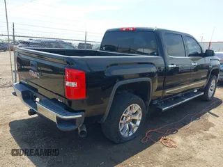 2015 GMC Sierra 1500 SLT with VIN 3GTU2VEC6FG328135, listed as a IAAI auction lot 42056412 with 151,458 mi miles and . Bid and sale history available at DreamBid. Image 4.