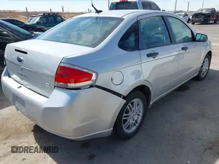 2009 Ford Focus SE z VIN 1FAHP35N99W173410, wystawiony jako IAAI lot #41648274 z przebiegiem 168 767 mil mil oraz . Historia ofert i sprzedaży dostępna na DreamBid. Obrazek 4.