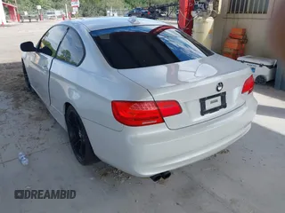2011 BMW 3 Series 328i with VIN WBAKE3C53BE557457, listed as a IAAI auction lot 41631581 with 112,272 mi miles and . Bid and sale history available at carsss.com. Image 3.