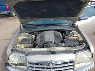 2006 Chrysler 300 C with VIN 2C3KA63HX6H487887, listed as a IAAI auction lot 41603068 with 133,169 mi miles. Bid and sale history available at carsss.com. Image 10.