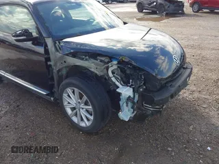 2018 Volkswagen Beetle S with VIN 3VWFD7ATXJM706338, listed as a IAAI auction lot 41293181 with 71,945 mi miles. Bid and sale history available at carsss.com. Image 6.