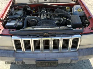 1997 Jeep Grand Cherokee TSi with VIN 1J4FX58SXVC545910, listed as a Copart auction lot 73142554 with 180,896 mi miles and Salvage Title. Bid and sale history available at carsss.com. Image 12.
