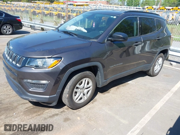 2019 Jeep Compass Sport with VIN 3C4NJCAB2KT613117, listed as a IAAI auction lot 41999519 with 73,734 mi miles and . Bid and sale history available at DreamBid. Image 17.