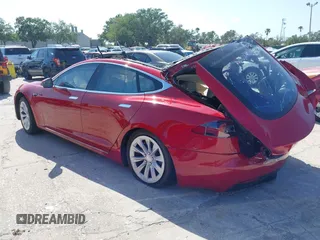 2016 Tesla Model S 90D with VIN 5YJSA1E27GF167442, listed as a IAAI auction lot 41989371 with Not Provided miles and . Bid and sale history available at DreamBid. Image 3.
