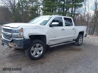 2017 Chevrolet Silverado 1500 LTZ with VIN 3GCUKSEC3HG295998, listed as a IAAI auction lot 41863695 with 160,573 mi miles. Bid and sale history available at carsss.com. Image 2.