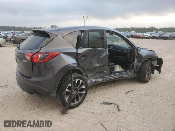 2016 Mazda CX-5 Grand Touring with VIN JM3KE4DY5G0865923, listed as a Copart auction lot 51637115 with 151,174 mi miles and Salvage Title. Bid and sale history available at carsss.com. Image 3.