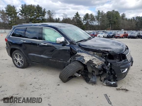 2021 Jeep Grand Cherokee Overland with VIN 1C4RJFCG6MC582917, listed as a Copart auction lot 50389315 with 55,000 mi miles and Salvage title. Bid and sale history available at DreamBid. Image 4.