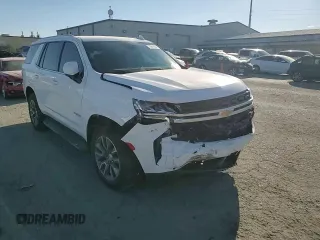 2023 Chevrolet Tahoe LS with VIN 1GNSCMKD7PR407530, listed as a Copart auction lot 73616884 with 11,871 mi miles and Salvage title. Bid and sale history available at DreamBid. Image 12.