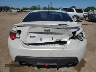 2014 Scion FR-S z VIN JF1ZNAA16E8702862, wystawiony jako Copart lot #57879575 z przebiegiem 101 775 mil mil oraz Szkoda całkowita • Salvage title. Historia ofert i sprzedaży dostępna na DreamBid. Obrazek 6.