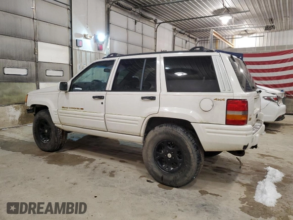 1997 Jeep Grand Cherokee Limited with VIN 1J4GZ78Y5VC747553, listed as a Copart auction lot 49125085 with 0 mi miles and Salvage Title. Bid and sale history available at carsss.com. Image 2.