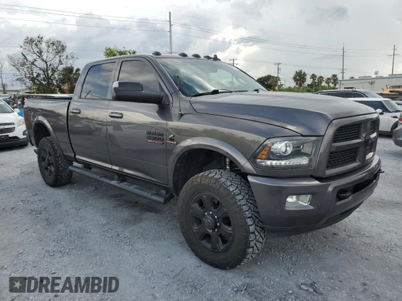 2016 Ram 2500 Laramie with VIN 3C6UR5FLXGG230499, listed as a Copart auction lot 60672185 with 152,049 mi miles and Salvage title. Bid and sale history available at DreamBid. Image 4.