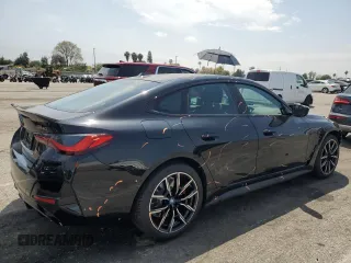 2024 BMW i4 M50 with VIN WBY33AW09RFS37404, listed as a Copart auction lot 51594984 with 776 mi miles and Salvage Title. Bid and sale history available at carsss.com. Image 3.