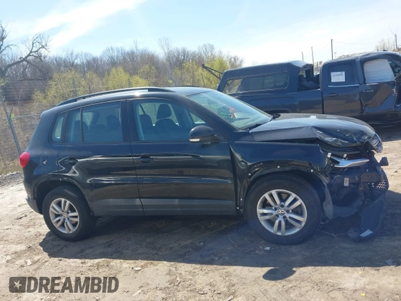 2017 Volkswagen Tiguan S with VIN WVGBV7AX9HK039244, listed as a IAAI auction lot 42050325 with 70,828 mi miles and . Bid and sale history available at DreamBid. Image 13.