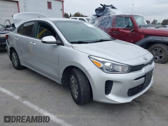 2020 Kia Rio LX with VIN 3KPA24AD7LE313579, listed as a IAAI auction lot 41884205 with 112,586 mi miles and . Bid and sale history available at DreamBid. Image 1.