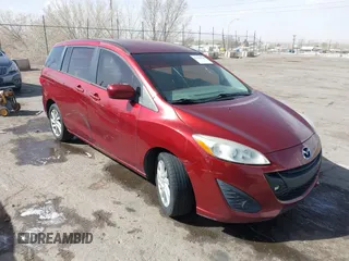 2012 Mazda 5 Sport z VIN JM1CW2BL1C0101034, wystawiony jako IAAI lot #41709638 z przebiegiem 144 717 mil mil oraz . Historia ofert i sprzedaży dostępna na DreamBid. Obrazek 1.