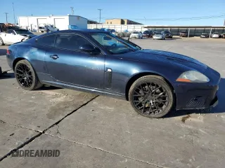 2008 Jaguar XK with VIN SAJWA43C589B23096, listed as a Copart auction lot 79337334 with 143,902 mi miles and Salvage Title. Bid and sale history available at carsss.com. Image 4.