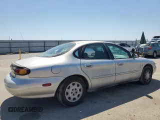 1997 Ford Taurus GL with VIN 1FALP5228VG222228, listed as a Copart auction lot 64806845 with 160,397 mi miles and Salvage title. Bid and sale history available at DreamBid. Image 3.