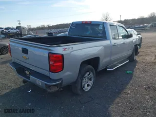 2017 Chevrolet Silverado 1500 LT with VIN 1GCVKREC8HZ336428, listed as a IAAI auction lot 41613213 with 110,799 mi miles. Bid and sale history available at carsss.com. Image 4.