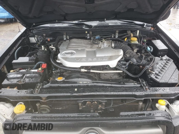 2004 Nissan Pathfinder SE with VIN JN8DR09Y44W911455, listed as a Copart auction lot 48134835 with 198,794 mi miles and Salvage title. Bid and sale history available at DreamBid. Image 12.