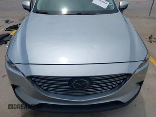 2018 Mazda CX-9 Touring with VIN JM3TCACY5J0219346, listed as a IAAI auction lot 42269310 with 93,989 mi miles and . Bid and sale history available at DreamBid. Image 6.